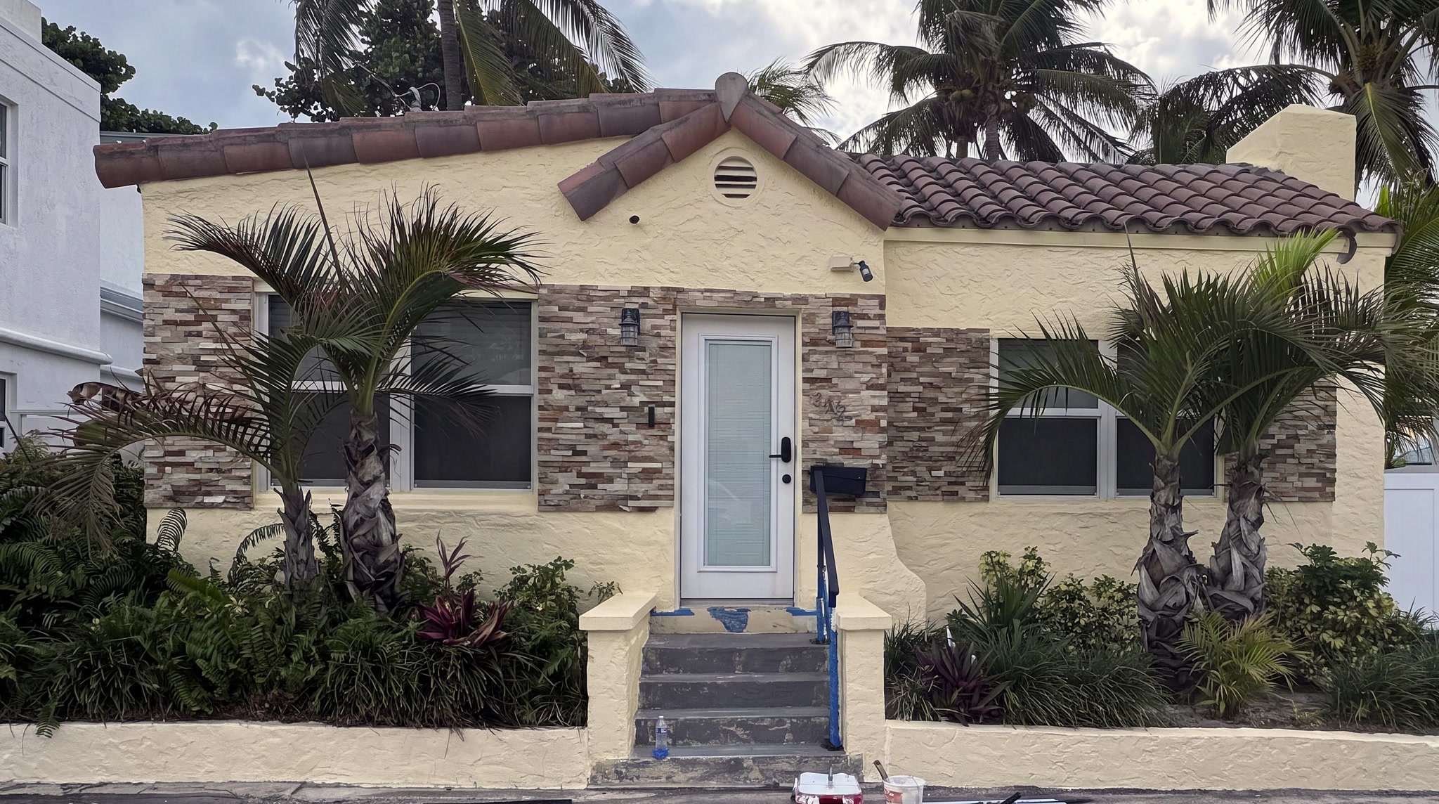 Before painting: warm yellow house exterior